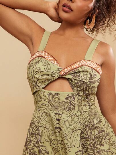 Travachic Macacão plus size feminino com estampa tropical de plantas, detalhe torcido e alças recortadas. Estilo férias, looks de verão para mulheres, looks de praia para mulheres, moda country feminina, look para shows, boho, férias tropicais.