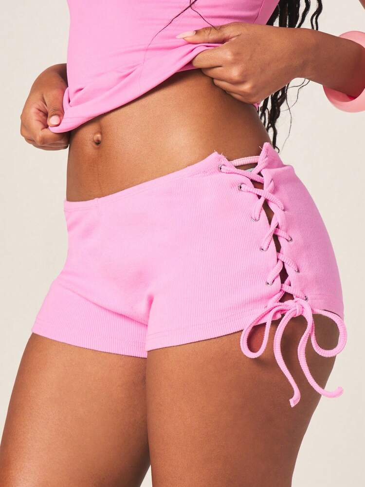 MISSGUIDED Women's Baby Pink Lace Up Ribbed Hotpants Summer Festival Mini Shorts Tie Side Details Eyelet Accents