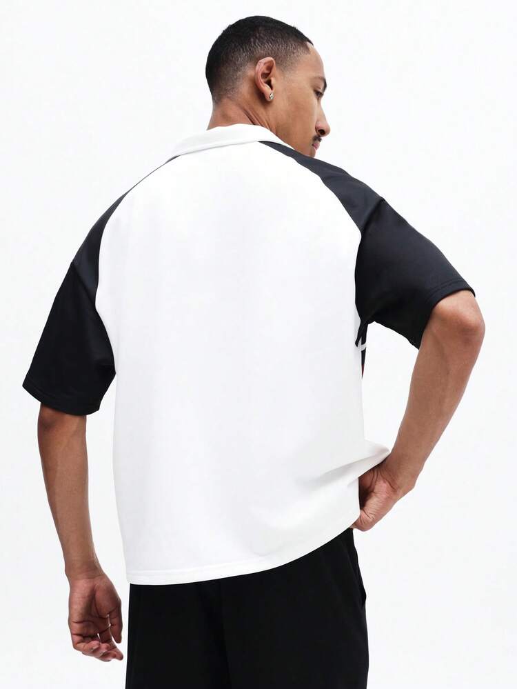 Polo à blocs de couleur avec motif drapeau