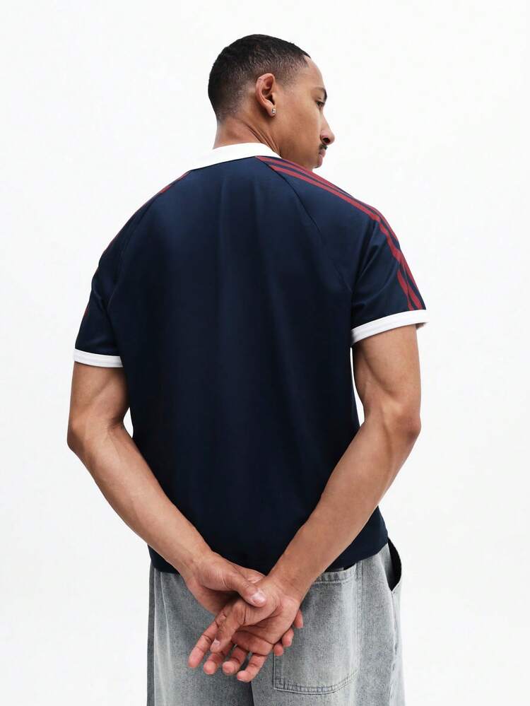 Frankreich 98 Polo mit gestreiften Ärmeln