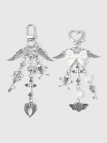 ROMWE Bộ 2 móc khóa/móc túi hình trái tim phong cách Gothic Y2K cá nhân hóa, ngọt ngào, cá tính, tối màu, màu bạc, đính ngọc trai giả, nơ, ngôi sao, xương, đầu lâu, chữ thập, cánh dơi, thích hợp cho các cặp đôi, chị em gái và bạn gái đeo hàng ngày, quà tặng ngày lễ. - Bạc - Xem 12