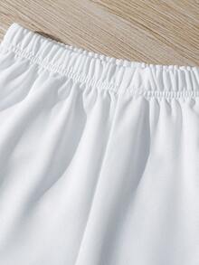 SHEIN Conjunto informal de 2 piezas para niño preadolescente con camiseta de manga corta con gráfico de letra grande y pantalones cortos de unicolor, estilo callejero - Blanco y Negro - Ver 8