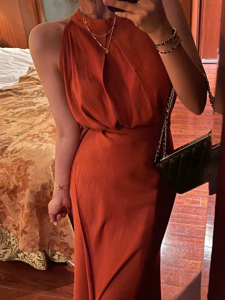 Women's Sleeveless Shirt And Solid Color Skirt Two Pieces Set