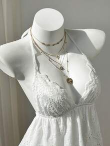 Elamini Sweet Summer Sleeveless Top With Deep V-Neck, Hollow-Out Embroidery, Tie-Up Neck And Ruffle Hem - White - View 4