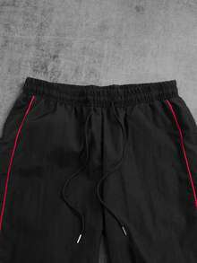 Manfinity ZONE917 Men's Black Cropped Sports Pants With Red Trim And Zipper Detail Windbreaker Pants Men Athletic Pants Track Pant Nylon Pants Parachute Pants Sweat Pants - Black - View 5