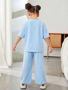 SHEIN Bộ đồ thể thao thường ngày cho mẹ và con gái, gồm áo thun tay rớt và quần dài, thích hợp cho mùa hè, thích hợp cho đi bộ/thể thao/đi học và mặc thường ngày, tuyệt vời cho mặc thường nhật và đi học vào mùa xuân và mùa thu, thích hợp cho mẹ và con gái, chị em gái và tôi. - Màu xanh lam - Xem 6