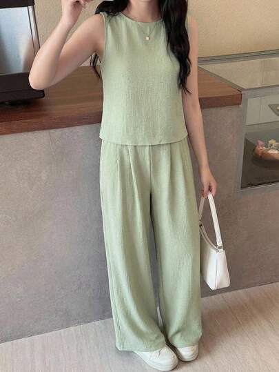 SHEIN Conjunto de top corto sin mangas y pantalón corto en color verde para adolescentes, con diseño de lazo en la espalda, atuendo casual de vacaciones, cómodo y holgado