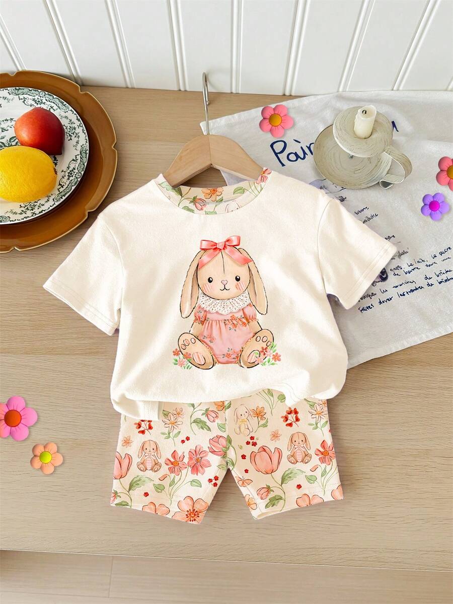 SHEIN LMoss Kids 奶油白,超可爱甜美3D蝴蝶结,蕾丝裙兔子插画图案,春夏波西米亚风印花休闲宽松圆领短袖T恤搭配紧身骑行短裤,适合春夏日常、居家、度假、节日、复活节、农场、户外、野餐等场合。 - 彩色 - 查看 1
