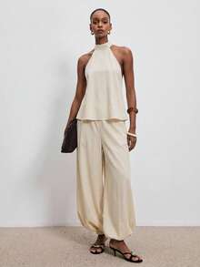 ATUI Studio 女士休闲露背吊带上衣和抽绳九分裤两件套，适合春、夏、秋季、日常通勤和度假穿着。 - 杏色 - 查看 3