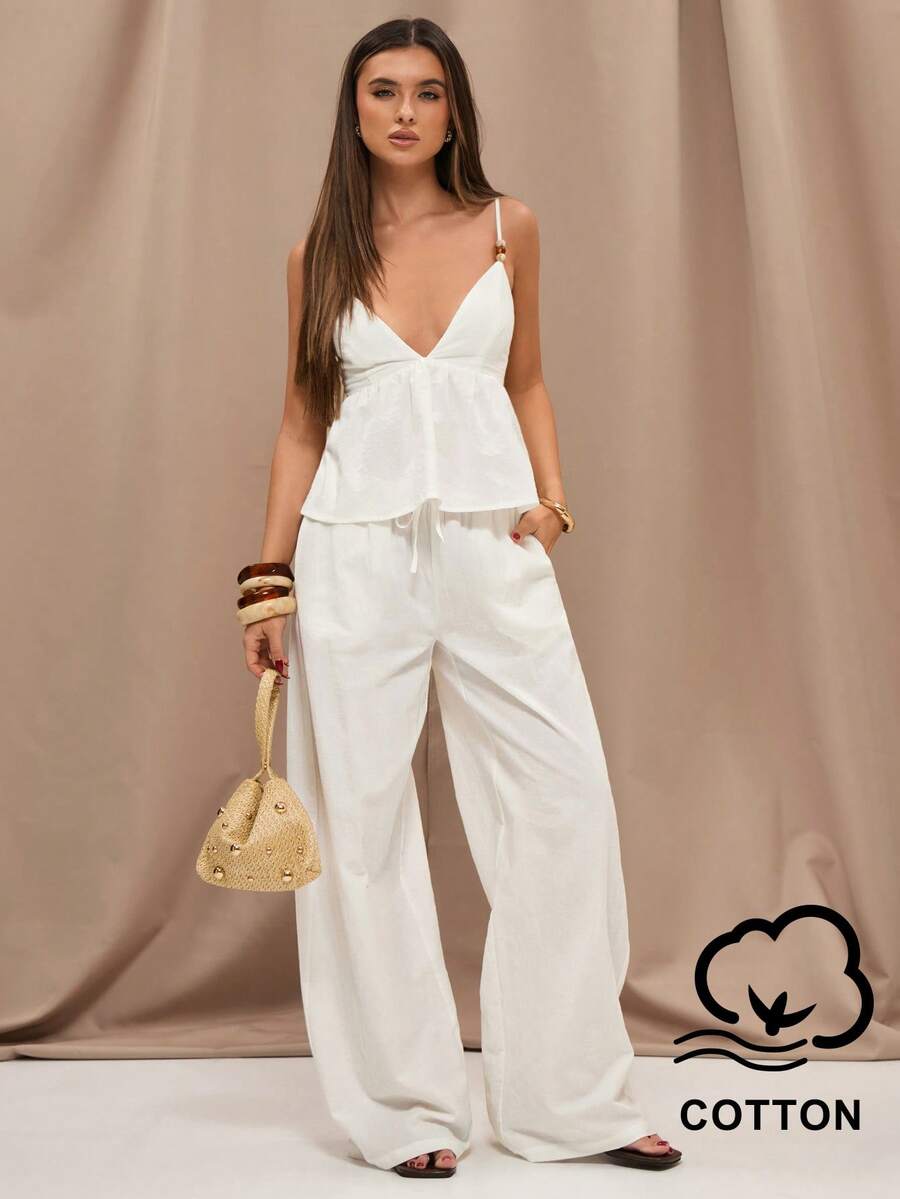 SHEIN BAE Bộ áo hai dây phối vải lanh pha, viền ren đính hạt và quần ống rộng cạp thấp có túi, thích hợp cho kỳ nghỉ ở miền Nam nước Pháp, kỳ nghỉ ở Ý, khu nghỉ dưỡng, bộ đồ vải lanh, bộ quần áo, bộ đồ đi biển, bộ đồ mùa hè. - trắng - Xem 1