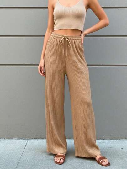 Pantalón de pierna ancha para mujer, casual y elegante. Ligeramente transparente. Sin bolsillos, tela de poliéster y spandex, apto para temporadas de primavera y verano. Ajuste de cintura natural con resorte y cordón. Colores lisos sin estampado. Interior muy suave y fresco, ideal para el uso diario.