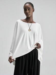 Ontre Camiseta feminina confortável e macia ao toque, de malha de alta qualidade, com decote canoa e mangas morcego. Ideal para uso casual, urbano, executivo, no aeroporto, para viagens, lazer, com um toque retrô discreto, perfeita para cruzeiros, minimalista, luxuosa e versátil. Estilo essencial e elegante. - Branco - Ver 6