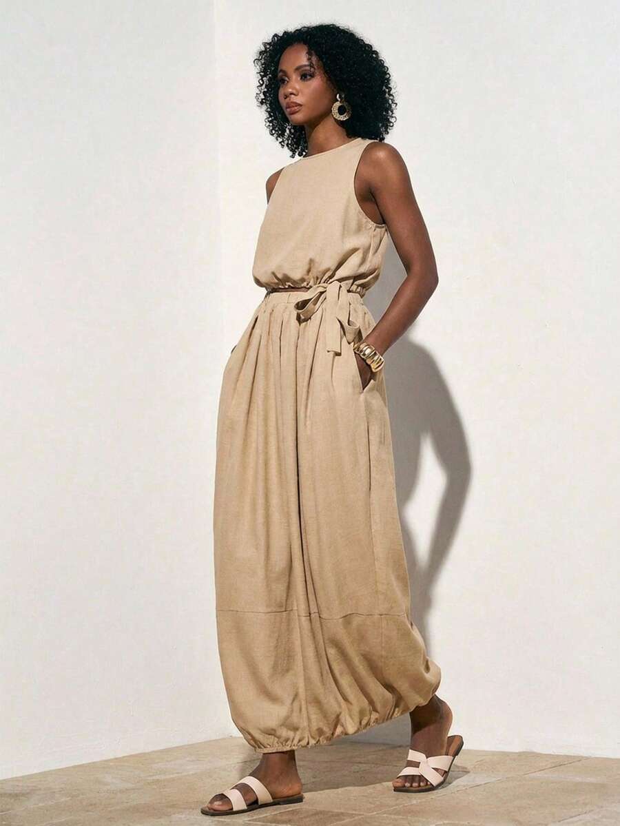 Zivah 22026 春夏新款休闲度假亚麻宽松热销卡其色圆领短款抽绳背心+郁金香长裙两件套。适合日常穿着、度假、旅行、海滩、西部风情、游牧风、节日庆典、机场穿搭、婚礼宾客装扮、通勤等场合。 - 卡其色 - 查看 1