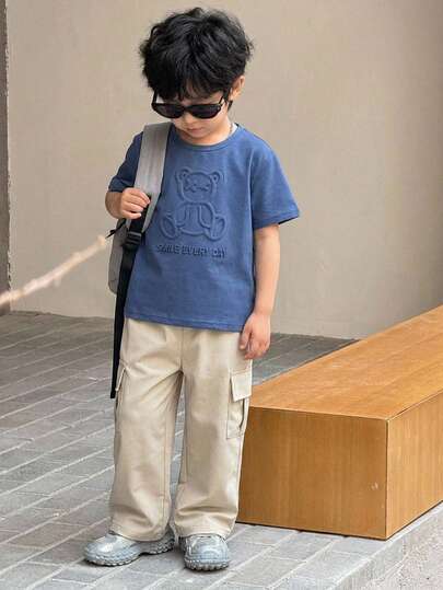 SHEIN 2pcs Young Boys' Embossed Letter Pattern Round Neck Short Sleeve T-Shirt With Cargo Pocket And Contrast Color Pants Set, Casual Sports Outfit Suitable For Spring, Summer, Autumn, Versatile For Vacation, School, Party