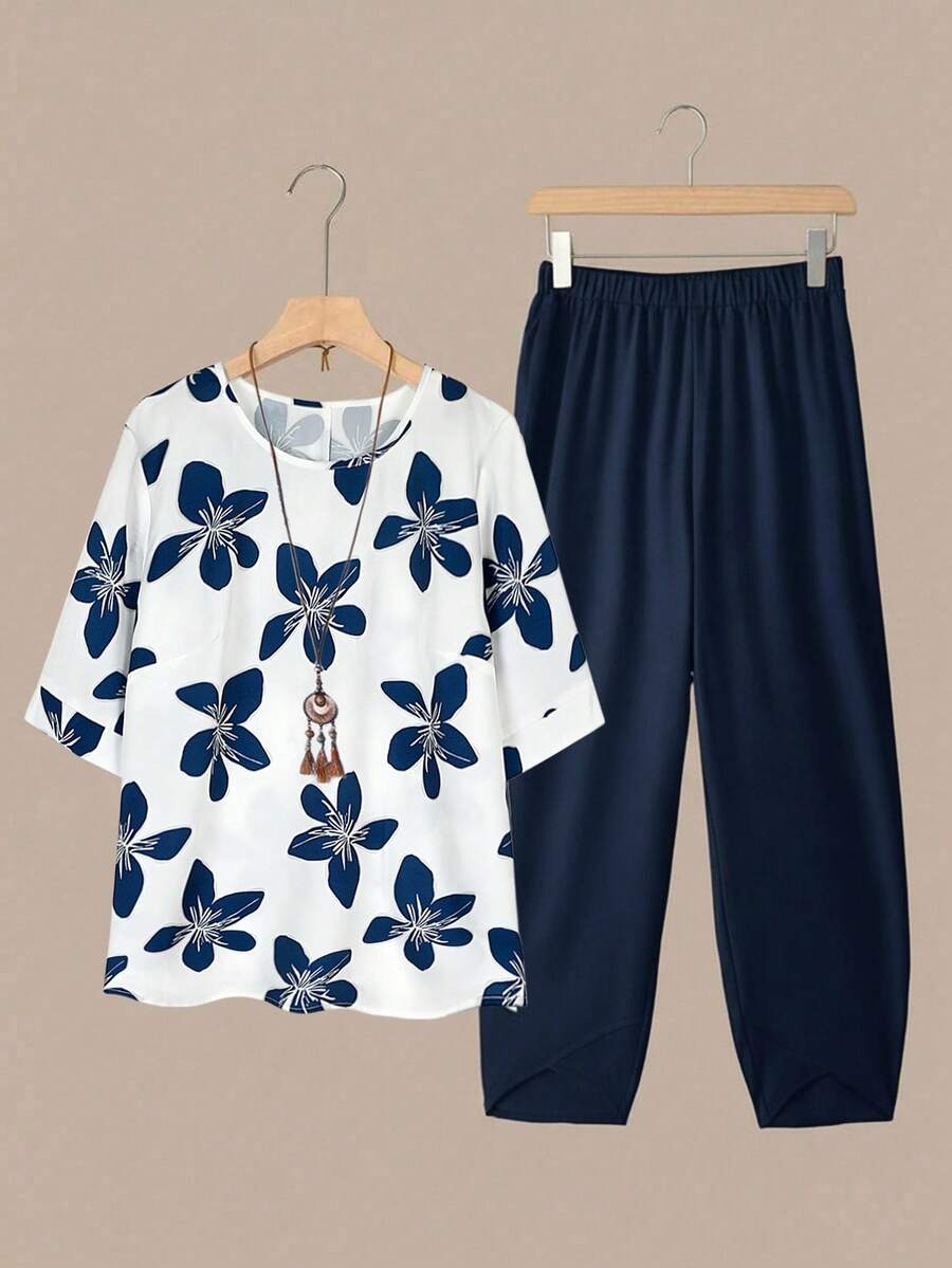 SHEIN LUNE CURVE Conjunto de 2 piezas de mujer talla grande de verano, casual y diario, con parte superior de manga corta con cuello redondo estampada y pantalones de cintura elástica - Multicolor - Ver 1