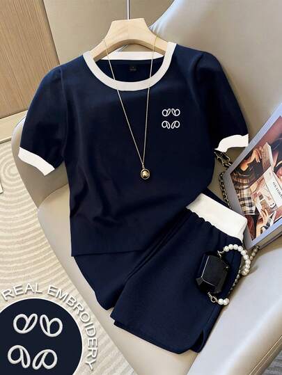 Resyla Conjunto de 2 piezas de top de manga corta y shorts con ribete de color contrastante, estilo casual de verano para mujer