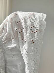 Elamini Sweet Summer Sleeveless Top With Deep V-Neck, Hollow-Out Embroidery, Tie-Up Neck And Ruffle Hem - White - View 7