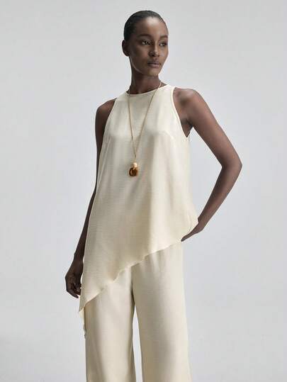 Ontre Bộ áo và quần màu be vạt lệch cho nữ, trang phục dự tiệc cưới hiện đại thanh lịch, phong cách tối giản lãng mạn kiểu Pháp sang trọng, thời trang thành thị, trang phục công sở thường ngày, trang phục cao cấp cổ điển kín đáo, phù hợp cho đi làm, đi sân bay, du lịch biển, lễ hội Trung Đông, trang phục thiết yếu theo mùa, trang phục cô dâu, trang phục nghỉ dưỡng.