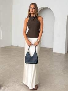 春夏秋季高领露背针织衫，蕾丝下摆不对称无袖上衣，适合晚间场合，尽显精致奢华风格。简约条纹针织无袖上衣，女士休闲时尚无袖背心，露背装饰链条，修身剪裁，黑色提花背心。夏季无袖露背不对称上衣，外出衬衫，街头风美学服饰。宽松休闲短袖圆领针织衫，夏季对称下摆T恤，修身显瘦，是工作和休闲场合的时尚百搭之选。 - 咖啡棕 - 查看 3