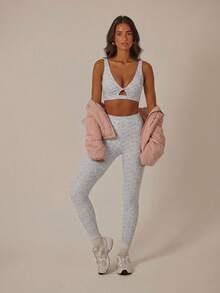 Aralina Bộ đồ thể thao năng động dành cho nữ, gồm áo croptop và quần legging in hoa, kiểu dáng xoắn phía trước, thích hợp cho tập gym và tập luyện. - Màu be - Xem 3