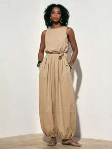 Zivah 22026 春夏新款休闲度假亚麻宽松热销卡其色圆领短款抽绳背心+郁金香长裙两件套。适合日常穿着、度假、旅行、海滩、西部风情、游牧风、节日庆典、机场穿搭、婚礼宾客装扮、通勤等场合。 - 卡其色 - 查看 3