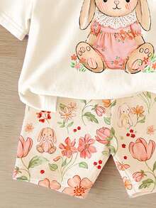 SHEIN LMoss Kids 奶油白，超可爱甜美3D蝴蝶结，蕾丝裙兔子插画图案，春夏波西米亚风印花休闲宽松圆领短袖T恤搭配紧身骑行短裤，适合春夏日常、居家、度假、节日、复活节、农场、户外、野餐等场合。 - 彩色 - 查看 5