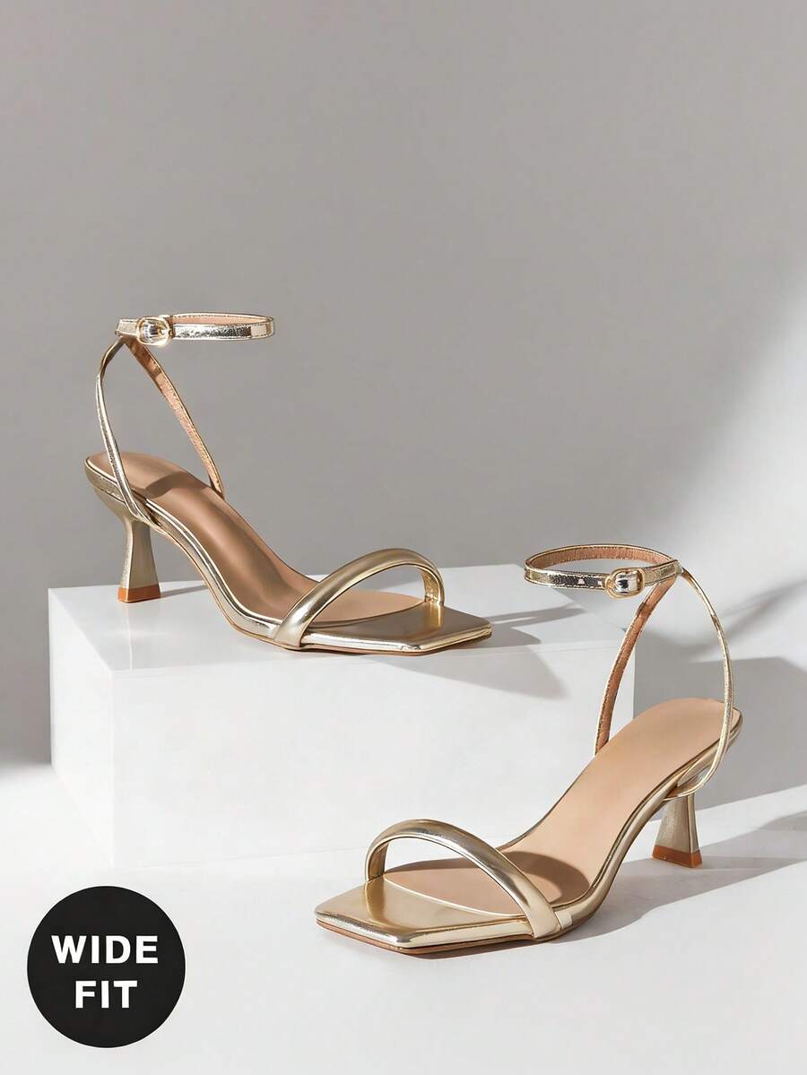 SHUZIA Women's Wide-Fit Elegant Minimalist Ankle Strap Stiletto Heel Sandals - Gold - View 1