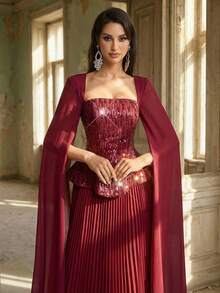 Aureia Sang trọng, quyến rũ, lãng mạn và thời trang, chiếc đầm chiffon thêu sequin màu đỏ tía này có cổ vuông, tay áo bồng bềnh, thiết kế 2 trong 1 và chân váy xếp ly rộng. Phù hợp cho mọi dịp trang trọng, bao gồm đám cưới, tiệc sinh nhật và những buổi dạ hội lộng lẫy. Đầm dạ hội trang trọng - Màu Đỏ Sâu - Xem 3