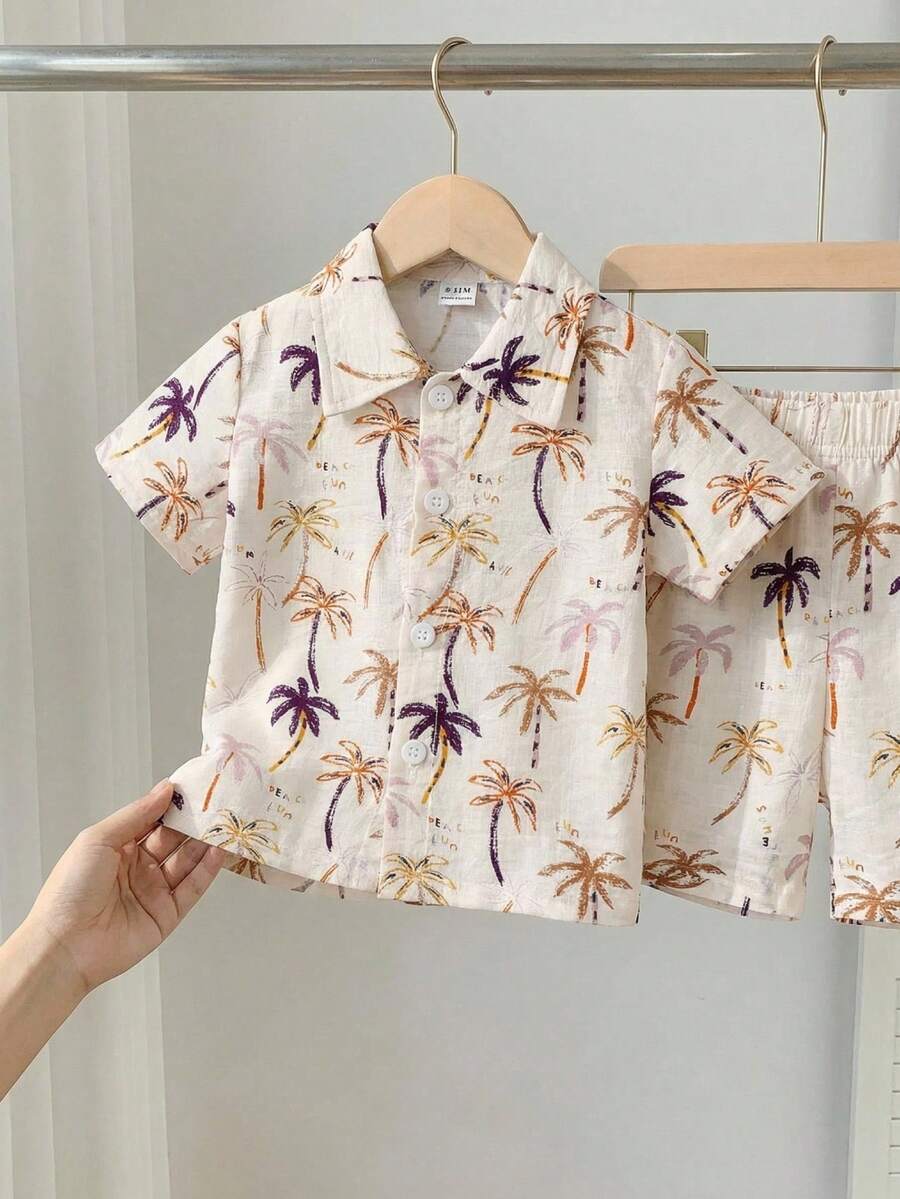 SHEIN مجموعة قميص كم قصير مطبوع ذو ياقة وشورت ذو خصر مطاطي للأطفال الصغار، مناسب للصيف والتنقل والمدرسة والأنشطة اليومية والعطلات، مقاس 6 أشهر - 3 سنوات، ملابس أطفال، ملابس رضع، ملابس أطفال صغار، تي شيرت أطفال صغار، شورت أطفال صغار - متعدد الألوان - مشاهدة 1