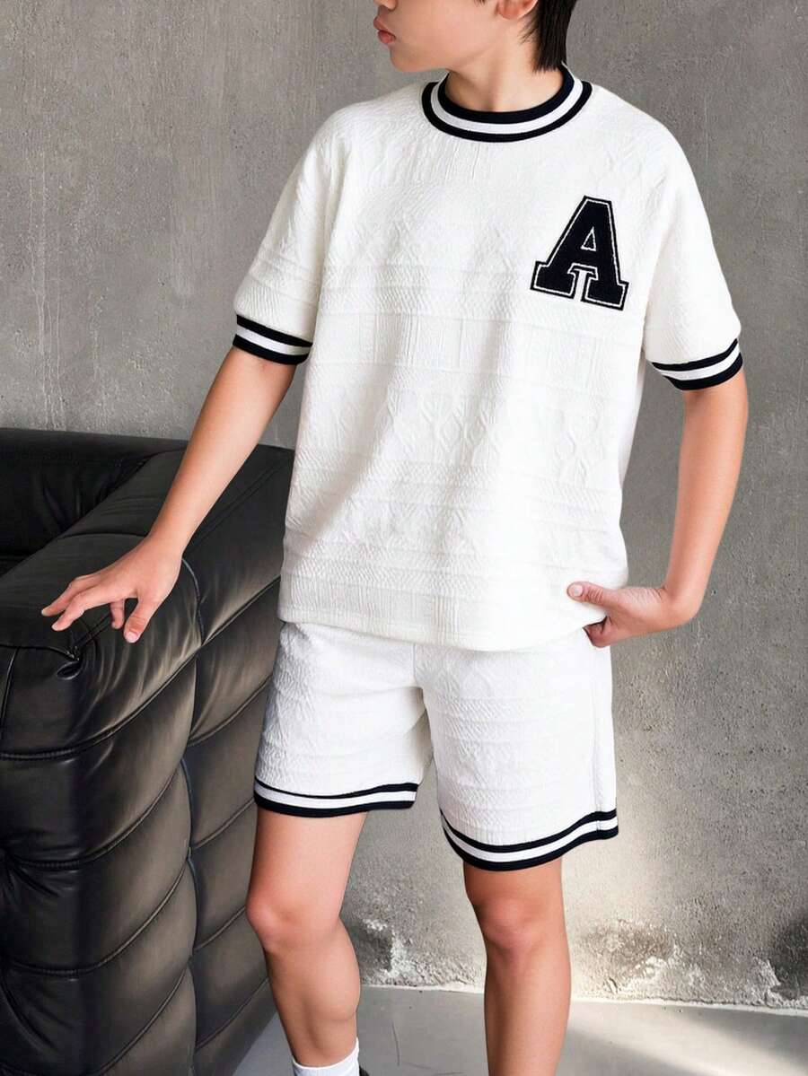 SHEIN 2pcs Kids Sports Outfit,Summer Casual Short Sleeve T-Shirt And Shorts Set,White Back-To-School Collegiate Style Round Neck,School Striped Trim Outfit - White - View 1