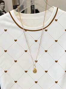 Resyla 棕色爱心格纹条纹袖撞色圆领T恤，Y2K美学爱心图案条纹袖休闲T恤，学院风爱心格纹撞色领夏季T恤，可爱爱心图案条纹袖休闲上衣，甜美女孩爱心格纹撞色滚边短袖T恤 - 白色 - 查看 3