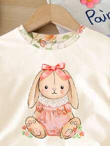 SHEIN LMoss Kids 奶油白，超可爱甜美3D蝴蝶结，蕾丝裙兔子插画图案，春夏波西米亚风印花休闲宽松圆领短袖T恤搭配紧身骑行短裤，适合春夏日常、居家、度假、节日、复活节、农场、户外、野餐等场合。 - 彩色 - 查看 4