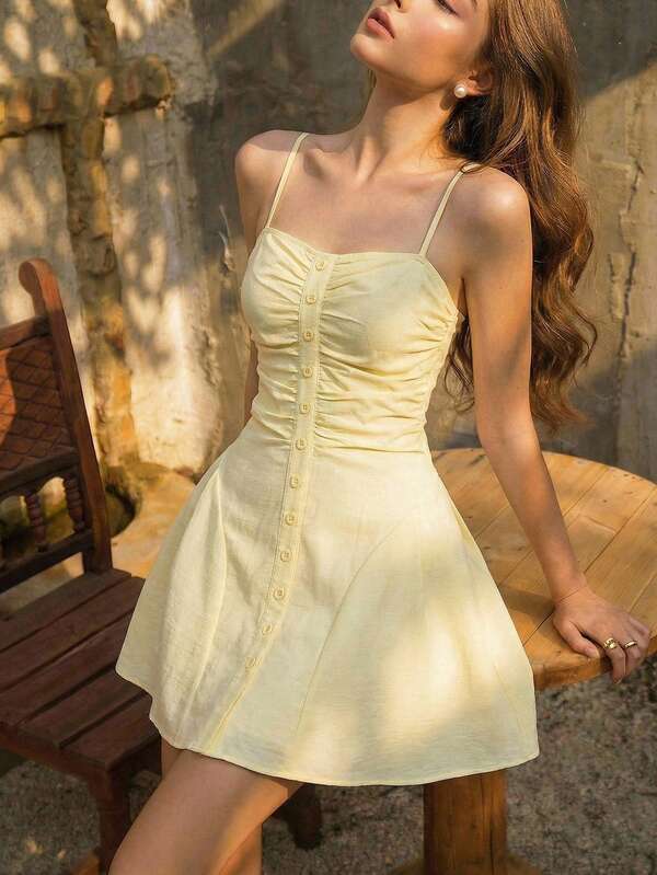 SHEIN MOD Women's Buttoned Decor Camisole Mini Dress, Pale Yellow,Tea Party Dress,Spring/Summer Outfits,Prom Dress,Birthday Dress,Summer Dress,Party Dress,Going Out,Tea Party Dress,Wedding,Holiday ,Vacation Dress,Corset Top Dress, Yellow Vacation Dress, Yellow Dress,Vacation Outfits,Holiday,Graduation Dress ,Summer Dress, Pale Yellow Dress