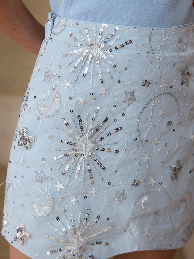 BLUE CURVED HEM CONTRAST SEQUIN STAR EMBROIDERED SKIRT