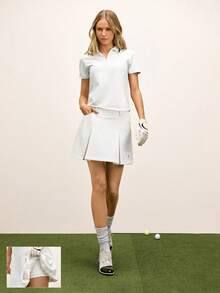 GLOWMODE 丝滑凉爽触感，UPF 50+ 防晒，吸汗速干，内置短裤，侧拉链口袋，后腰袢带，褶裥后摆设计，迷你高尔夫裙，适合高尔夫、网球、匹克球等运动，日常休闲穿着。 - 白色 - 查看 9