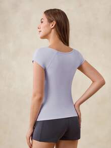 OutZeal Áo tập gym nữ, áo thun thể thao màu trơn, mùa hè xuân, tennis, yoga, áo casual, thoáng mát, ôm sát, tay ngắn, giúp kiểm soát vòng bụng, thích hợp cho hoạt động thể thao. - Màu tím - Xem 7