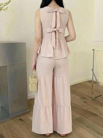 SHEIN 少女杏色纯色荷叶边下摆、蝴蝶结后背、松紧腰无袖上衣和阔腿裤两件套，休闲、优雅、法式风格