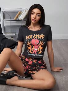 SHEIN HOT STUFF Conjunto de ropa de estar en casa informal con top de manga corta y cuello redondo con estampado de letras y dibujos, y shorts para mujer - Negro - Ver 1