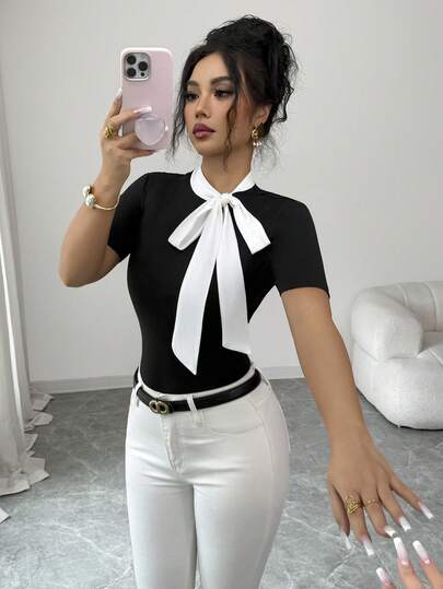 Elenzga Blusa de manga corta con cuello y lazo en contraste de color negro y blanco, elegante y ajustada, adecuada para fiestas, citas, ceremonias de graduación, Día del Maestro, Acción de Gracias, regreso a clases, uso diario. Blusa de manga corta con cuello en contraste de color, adecuada para uso diario, todas las estaciones. Blusa de manga corta con lazo en contraste de color, adecuada para el verano