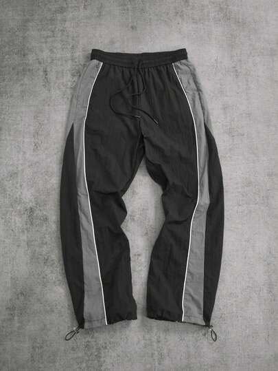 Manfinity ZONE917 Men's Solid Color Splicing Front Lace-Up Casual Sports Pants Fall Breathable Sweat Pants