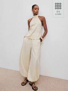 ATUI Studio 女士休闲露背吊带上衣和抽绳九分裤两件套，适合春、夏、秋季、日常通勤和度假穿着。 - 杏色 - 查看 1