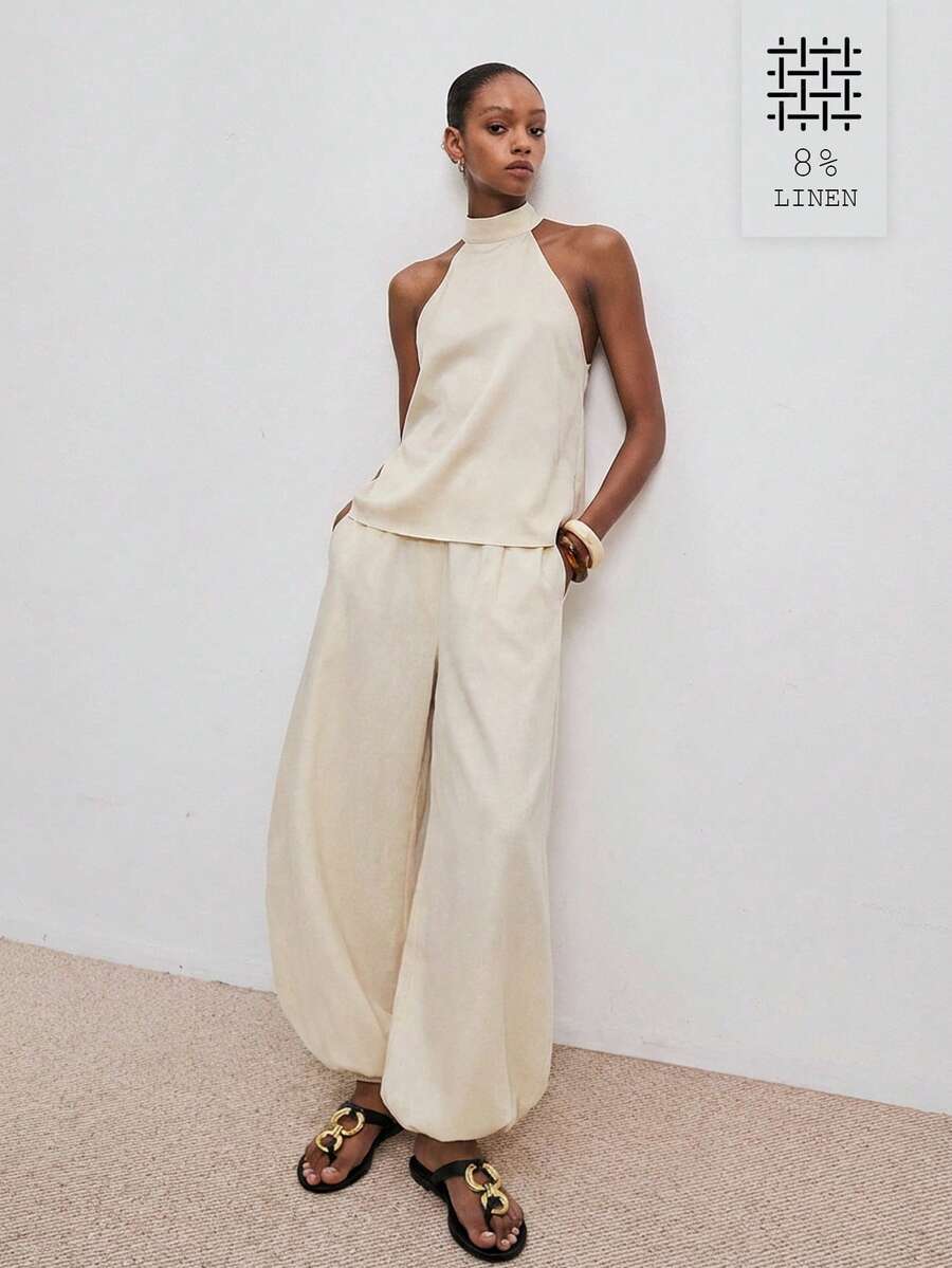 ATUI Studio 女士休闲露背吊带上衣和抽绳九分裤两件套，适合春、夏、秋季、日常通勤和度假穿着。 - 杏色 - 查看 1