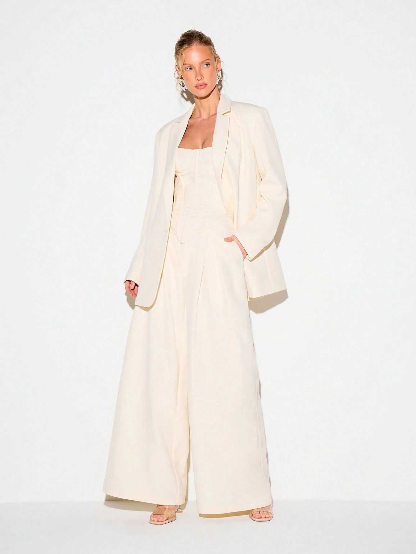 KIZN Pantaloni sartoriali a gamba larga e vita bassa