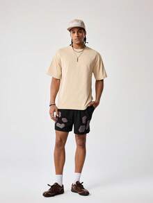 Tetris™ X SHEIN 男士几何印花松紧腰带口袋宽松休闲短裤 - 黑色 - 查看 1