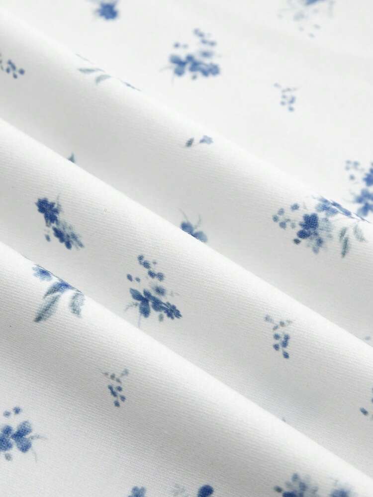 Ecru And Blue Floral Jersey Maxi Dress With A V-Neckline Trimmed In White Lace Spring Summer Vacation Dress French Style Parisian Style Cute Elegant Dress Evening Dress Vintage Holiday Dress Dresses For Woman Summer Floral Print Dress Lace Trim Dress Sleeveless Dress