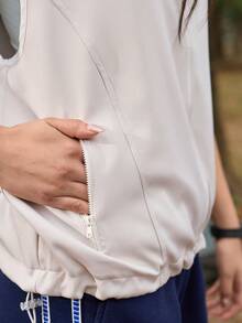 Exploreva Áo khoác gile nữ màu trơn có khóa kéo, kiểu dáng thường ngày đa năng, thích hợp mặc ngoài trời, tập yoga, leo núi, áo gile thể thao nữ, áo gile không tay, áo khoác yoga, áo gile leo núi, áo gile ngoài trời nữ, áo gile có khóa kéo, áo gile thể thao nữ, áo gile ngoài trời nữ. - Màu be - Xem 5