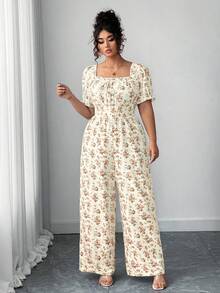 Elenzga Bộ áo liền quần nữ cổ vuông họa tiết hoa nhí, tay cánh hoa, lưng hở, thắt nơ phía trước. - Nhiều màu - Xem 3