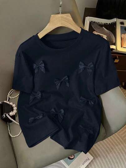 EMERY ROSE Kadınlar için Günlük Yuvarlak Yaka 3D Fiyonklu Kısa Kollu Tişört, Yaz Stili, Büyük Beden Üst