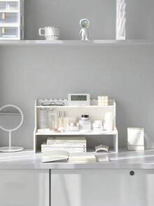 这款白色双层增高桌面置物架（1件套）适用于卧室、客厅、书房、办公室和宿舍。它是一款桌面置物架，可用于存放化妆品、香水、珠宝、文具和其他杂物，方便分类和展示。 - 白色 - 查看 8