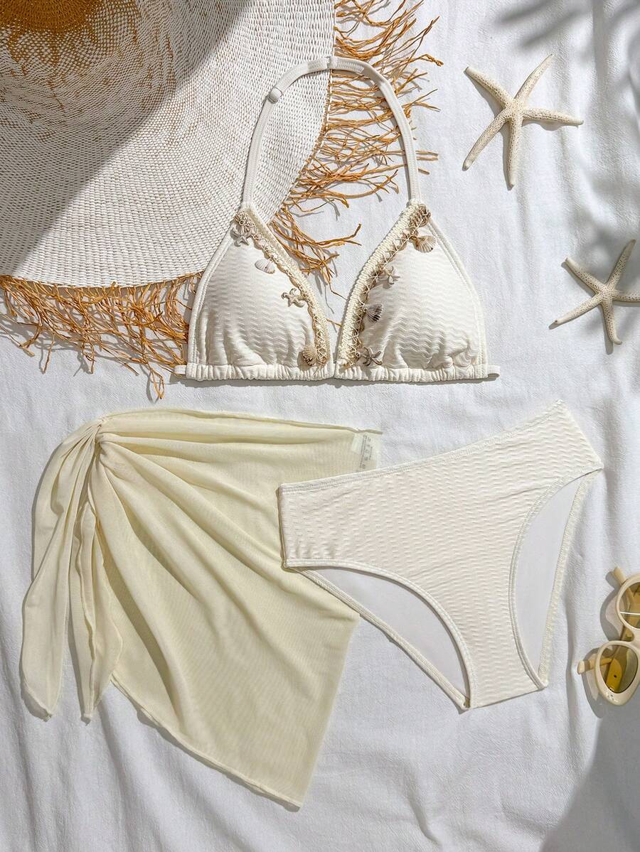 SHEIN 3pcs Teen GirlBlack Swimsuit Set, Beach Holiday Party, Spring/Summer Teen Bikini 3 Piece Swimsuit Set Bikini Bikini Set Bathing Suit Set 3 Piece Bikini Set Seashell Bathing Suit Three-Piece Swimsuit Set Beach Girl Outfit Modest Bikini Set Three Piece Swimsuit Set Bathing Suit Sets Sets 2 Piece Summer Summer Bathing Suits Bikini Set With Sarong Skirt Bathing Suits 3 Piece White Bikini Set Swimsuits White Halter Bikini Swimwear Set Teen Swimsuit 3pcs Set Bikini With Sarong Skirt - Apricot - View 1